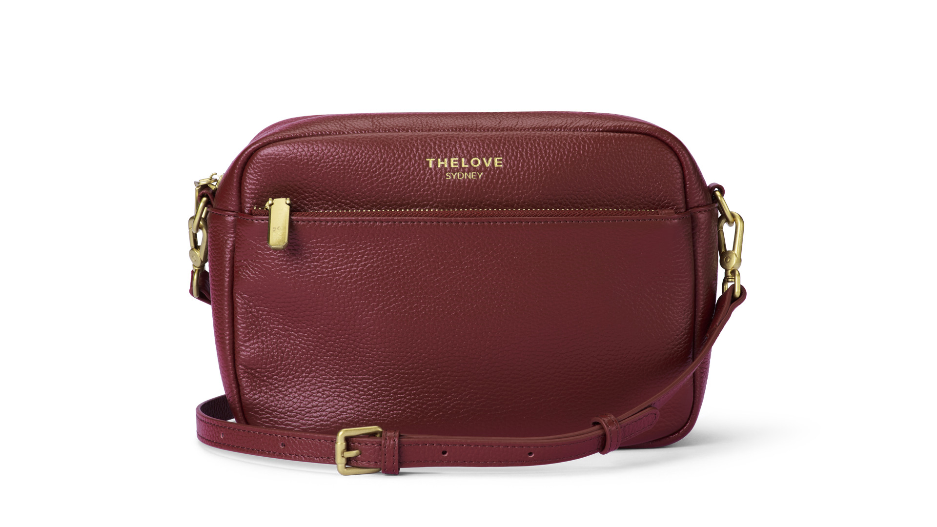 Mel Roomy Leather crossbody bag in Red Berry with gold accents.