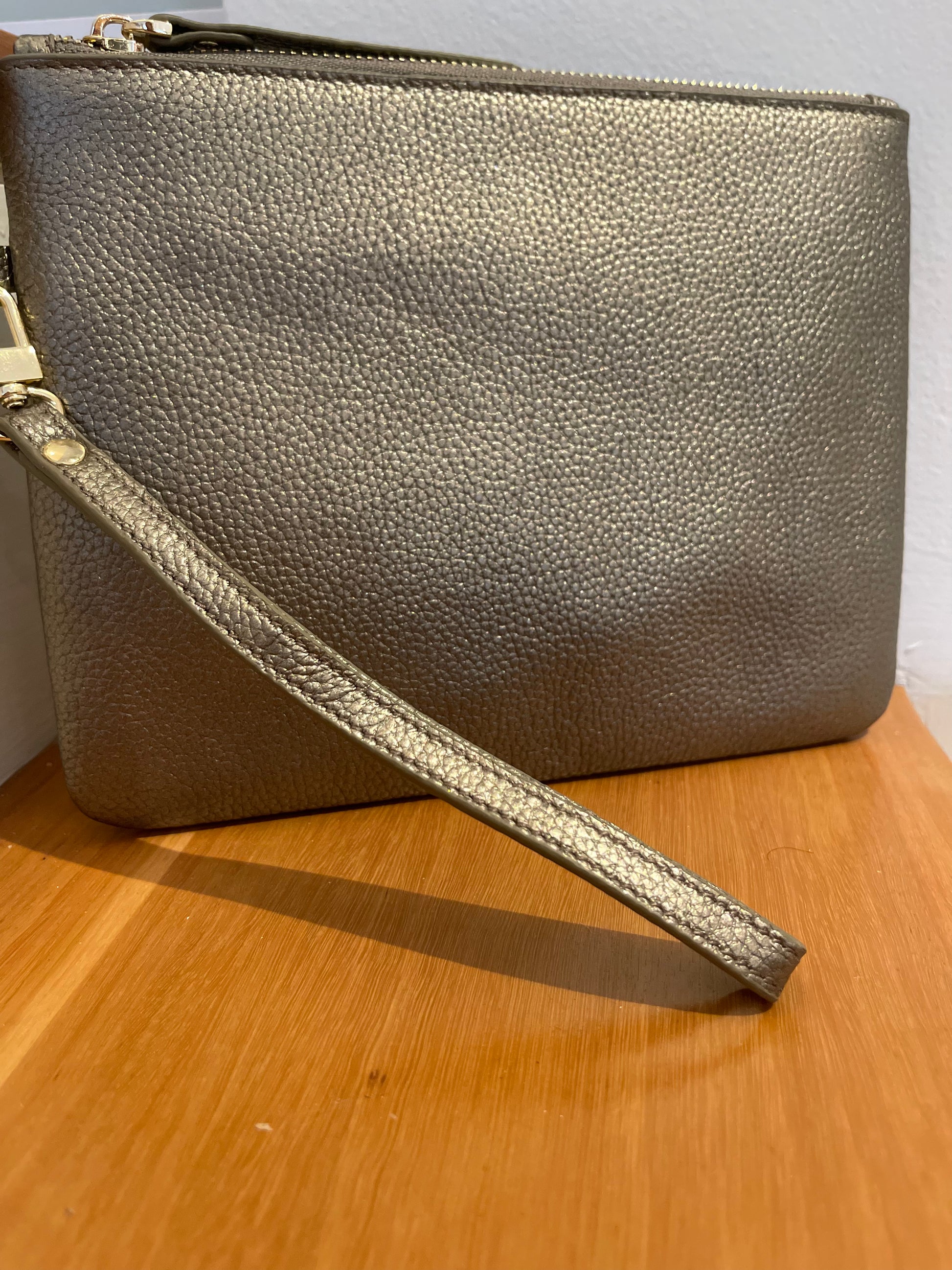 Silver clutch clearance with wrist strap